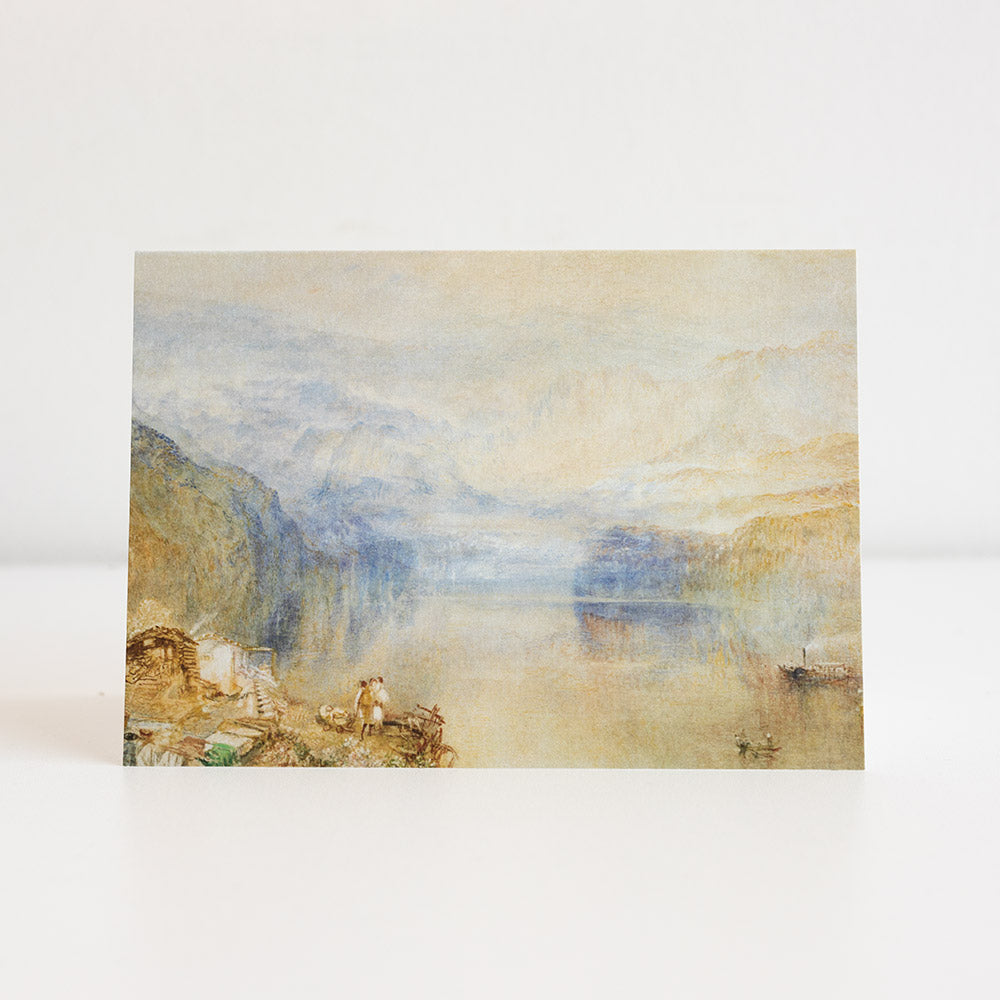 Greetings card featuring a landscape painting with misty mountains and figures on a white background