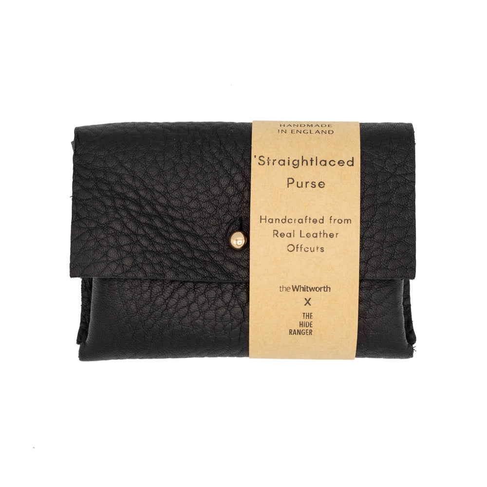 Rectangular black leather purse with stud enclosure and branded belly band, photographed against a white background.