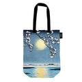 Tote bag featuring beautiful Japanese river artwork. Black handle. Presented on a white background.