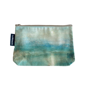 A cosmetics bag in front of a white background. The bag has a reproduction of Moonlight on Lake Lucerne by William Turner.