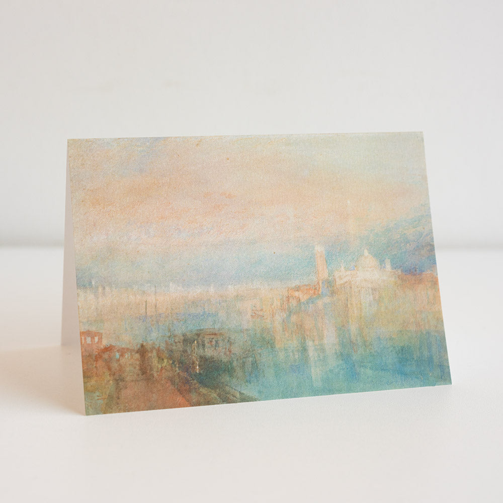 Greeting card with a watercolor landscape design on a white background
