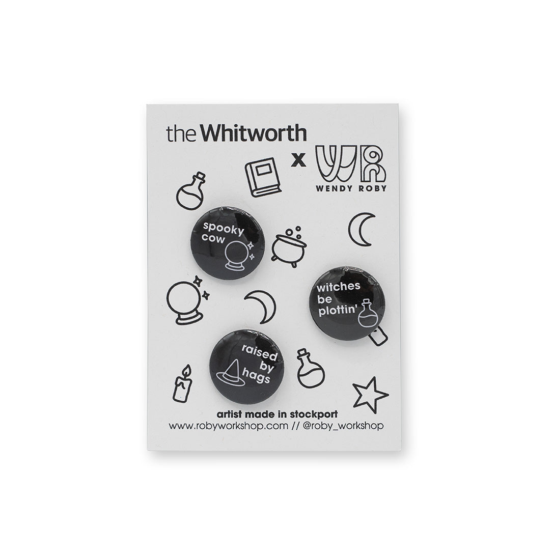 Set of three badges with different witchy slogans against a white background