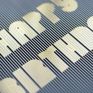 Close up of metallic detail lettering on the birthday card.