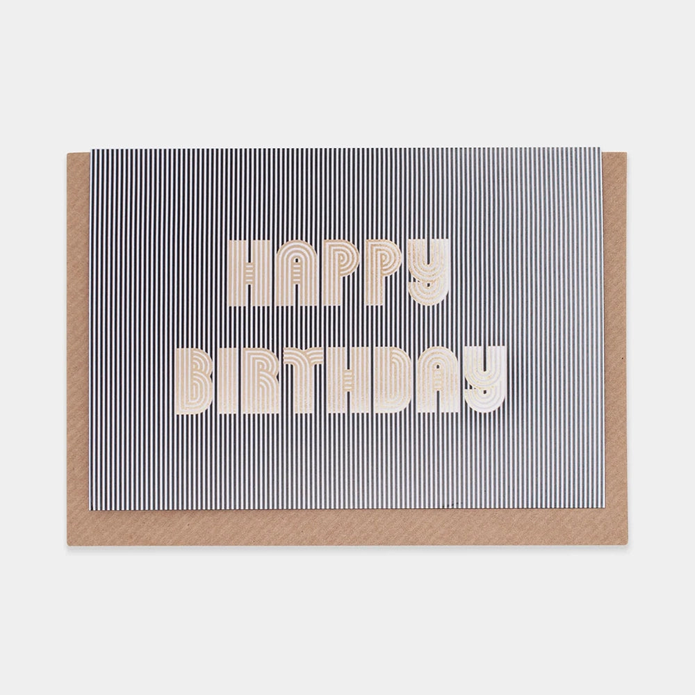 This is a birthday card with black and white stripes and the words "HAPPY BIRTHDAY" written in a cool, bubbly font.