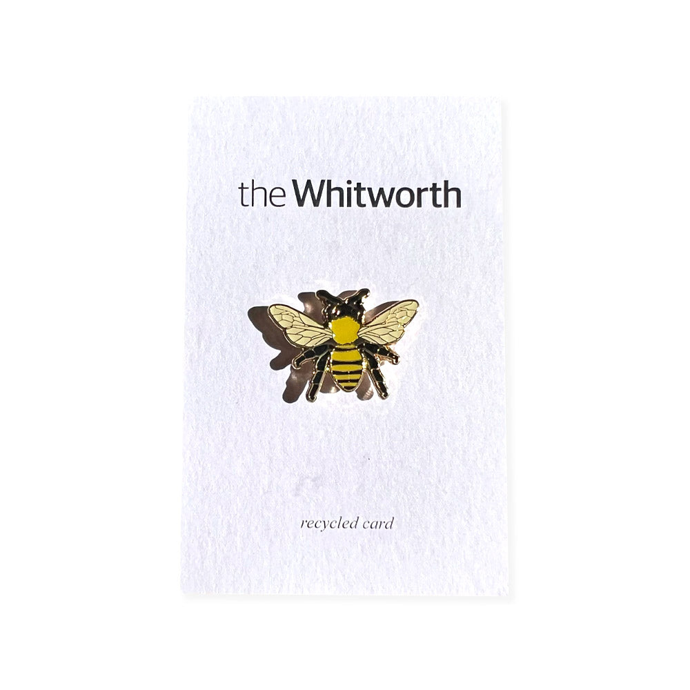 Gold plated worker bee pin badge, presented on recycled card. Whitworth logo.