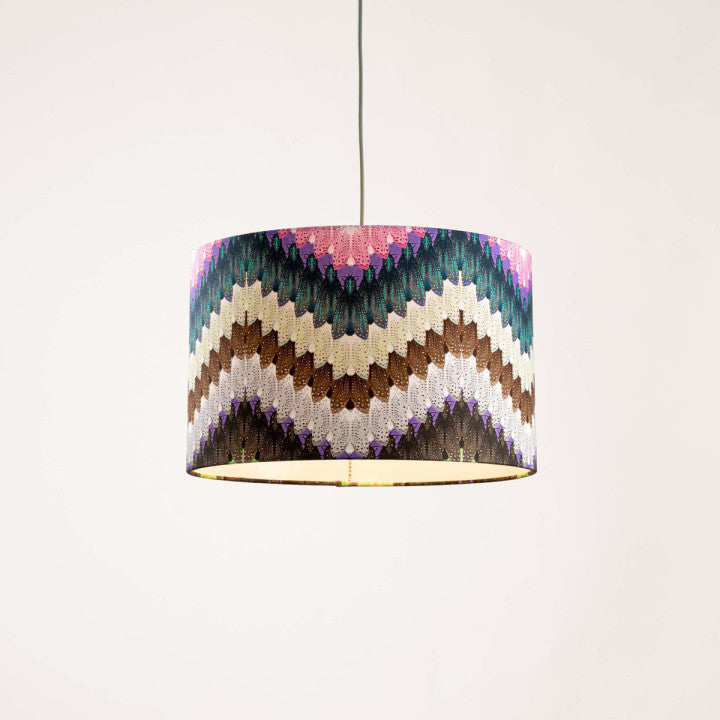 Lampshade featuring a zig zag colourful pattern designed by Timorous Beasties.