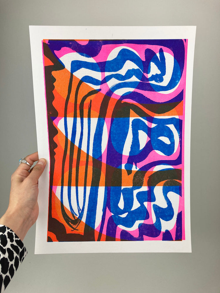 Image of a person holding a colourful risograph print. Pink and orange background with blue wave pattern overlay. White border.