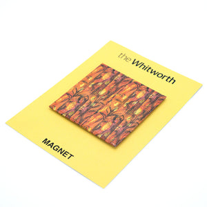 The magnet on the yellow backing card that reads the whitworth at the top and magnet at the bottom. Its lying at an angle on a white background.