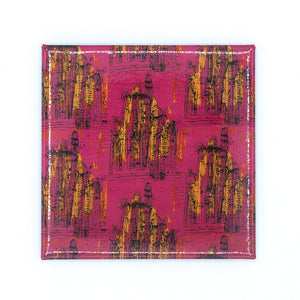 Painted Desert artwork as a square magnet on a white background. The primary colours of the artwork are dark pink and orange.