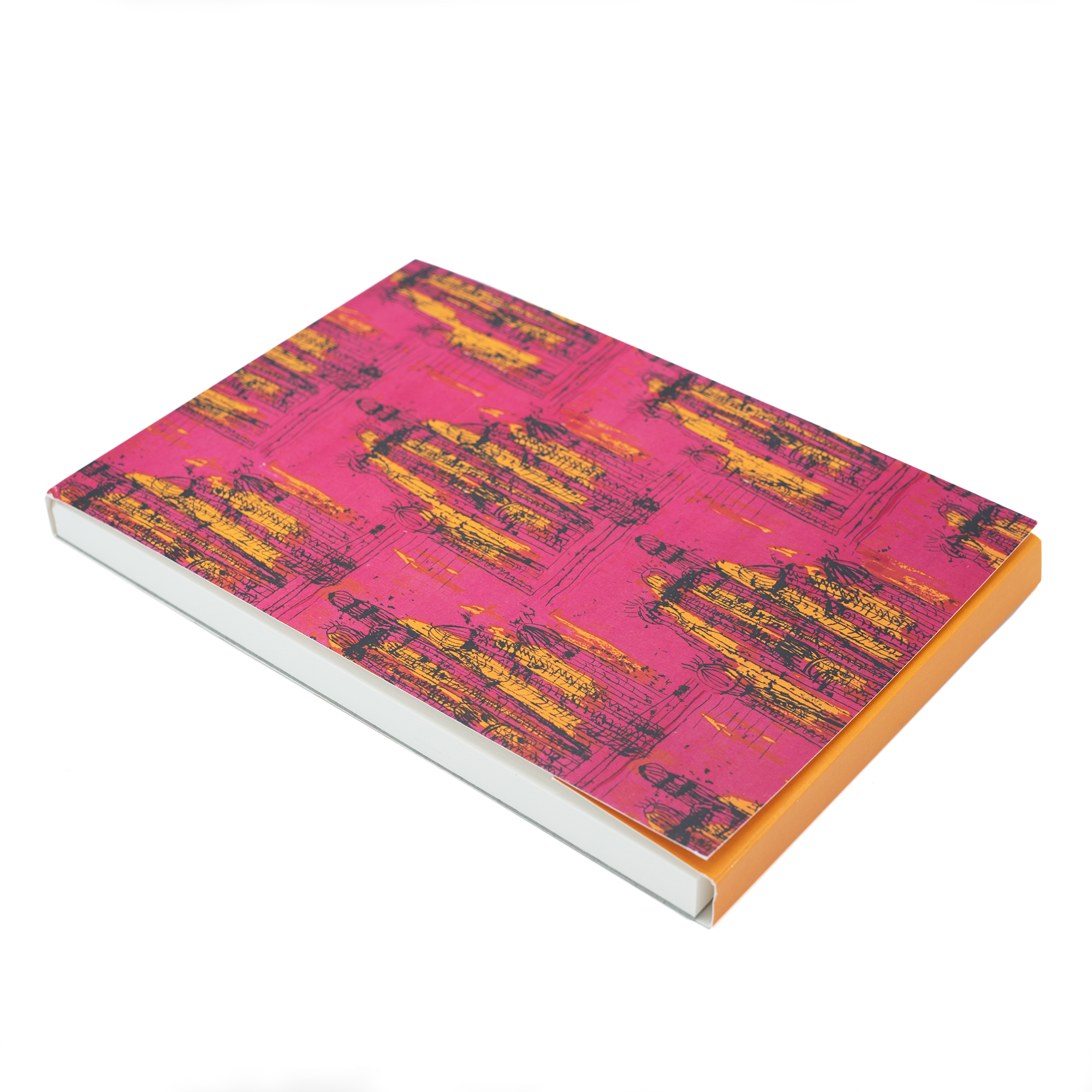 Image of an A5 Sketchpad against a white background. The front cover is a pink, yellow and orange textile design by Althea McNish: 'Painted Desert'