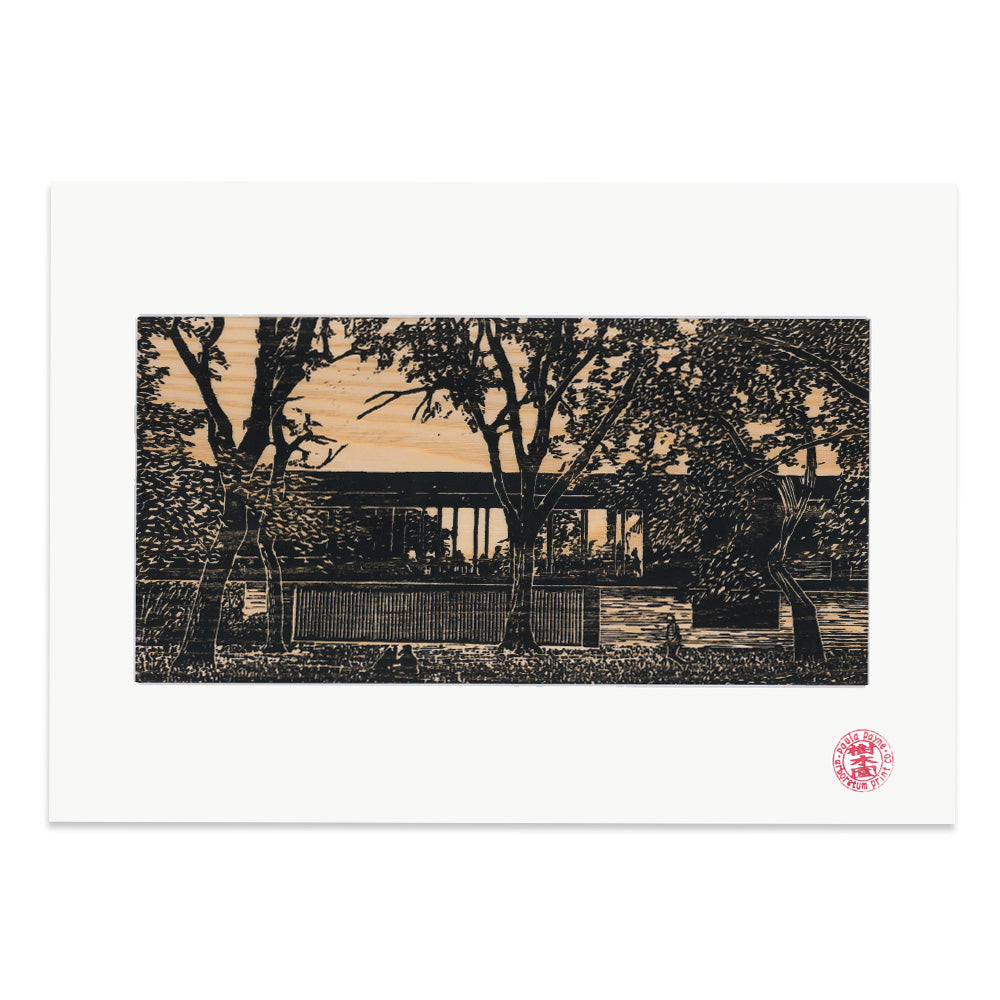 Photo of an artist print of the Whitworth Cafe surrounded by Trees. Lino print on Wood Vaneer