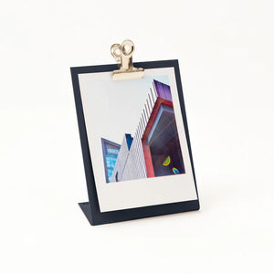 White background shot of the dark grey clipboard frame with a generic print.