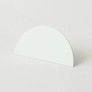 Semi-circular photo clip in white, seen at a slight angle against white background.