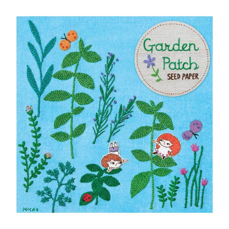 Packaging for Garden Patch Seed Paper. An embroidered design of plants and butterflies.