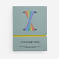 An image of a box of cards with the word 'Inspiration' in the bottom centre and a rainbow graphic in the the top centre.