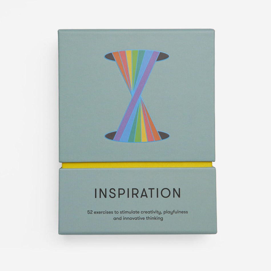 An image of a box of cards with the word 'Inspiration' in the bottom centre and a rainbow graphic in the the top centre.