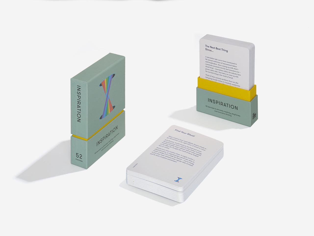 An image of three boxes of cards. Left box the word 'Inspiration' in the bottom centre and a rainbow graphic in the the top centre.