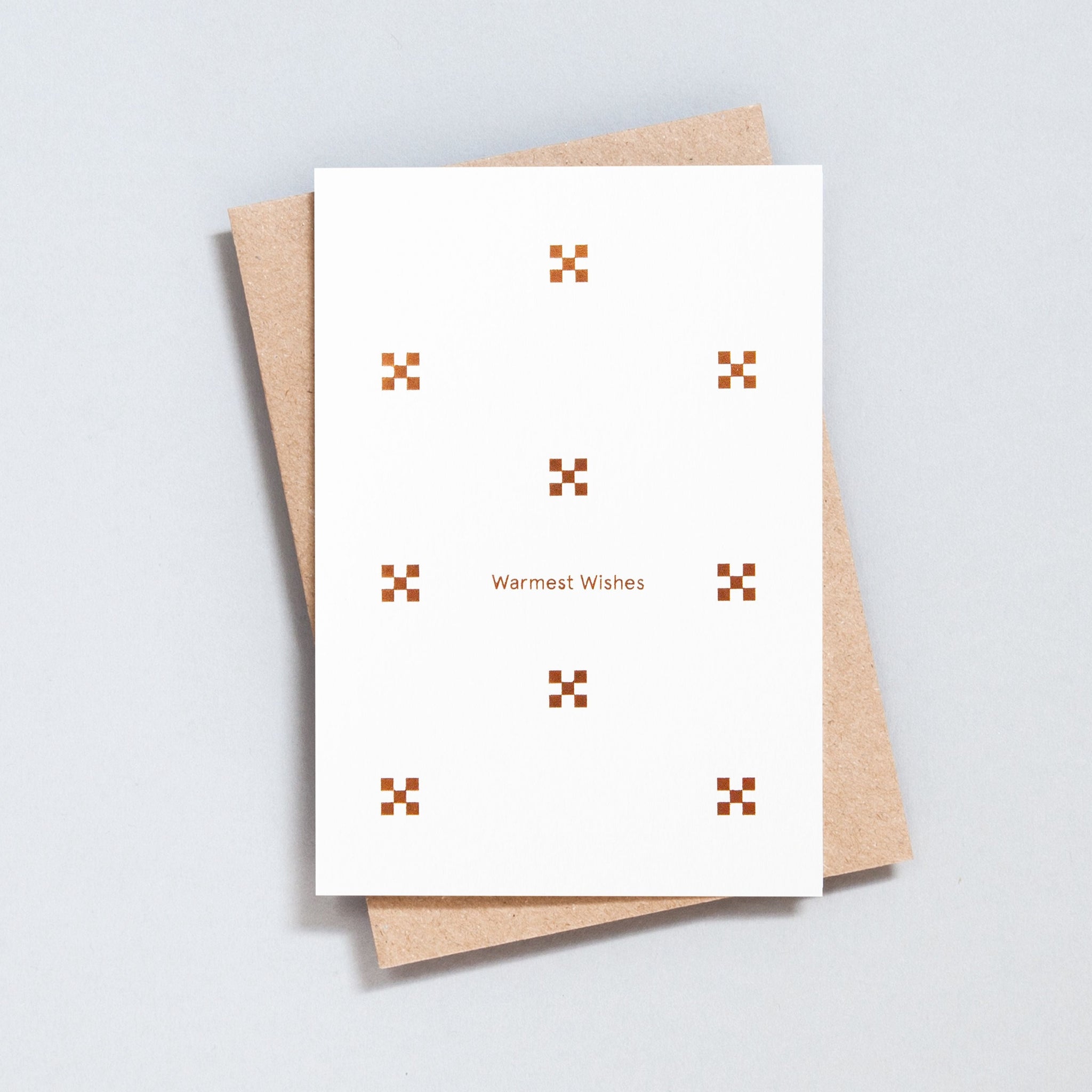 White card with simple check pattern and the words 'Warmest Wishes'