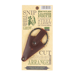 Small garden scissors in leather pouch photographed against branded backing card