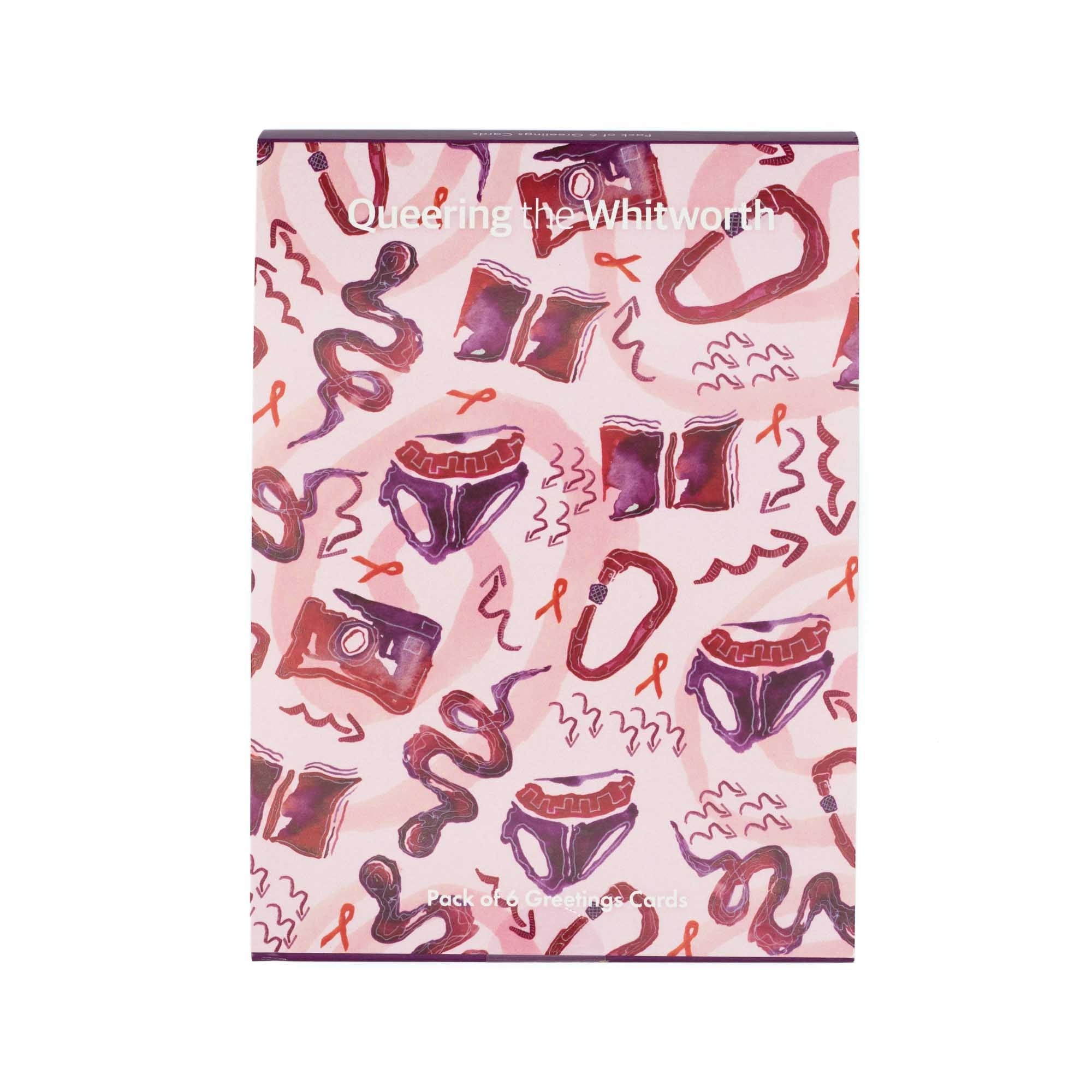 The outside packaging of a set of greetings cards featuring a design by Sarah-Joy Ford againt a white background. Pink, red and purple pattern design. White background.