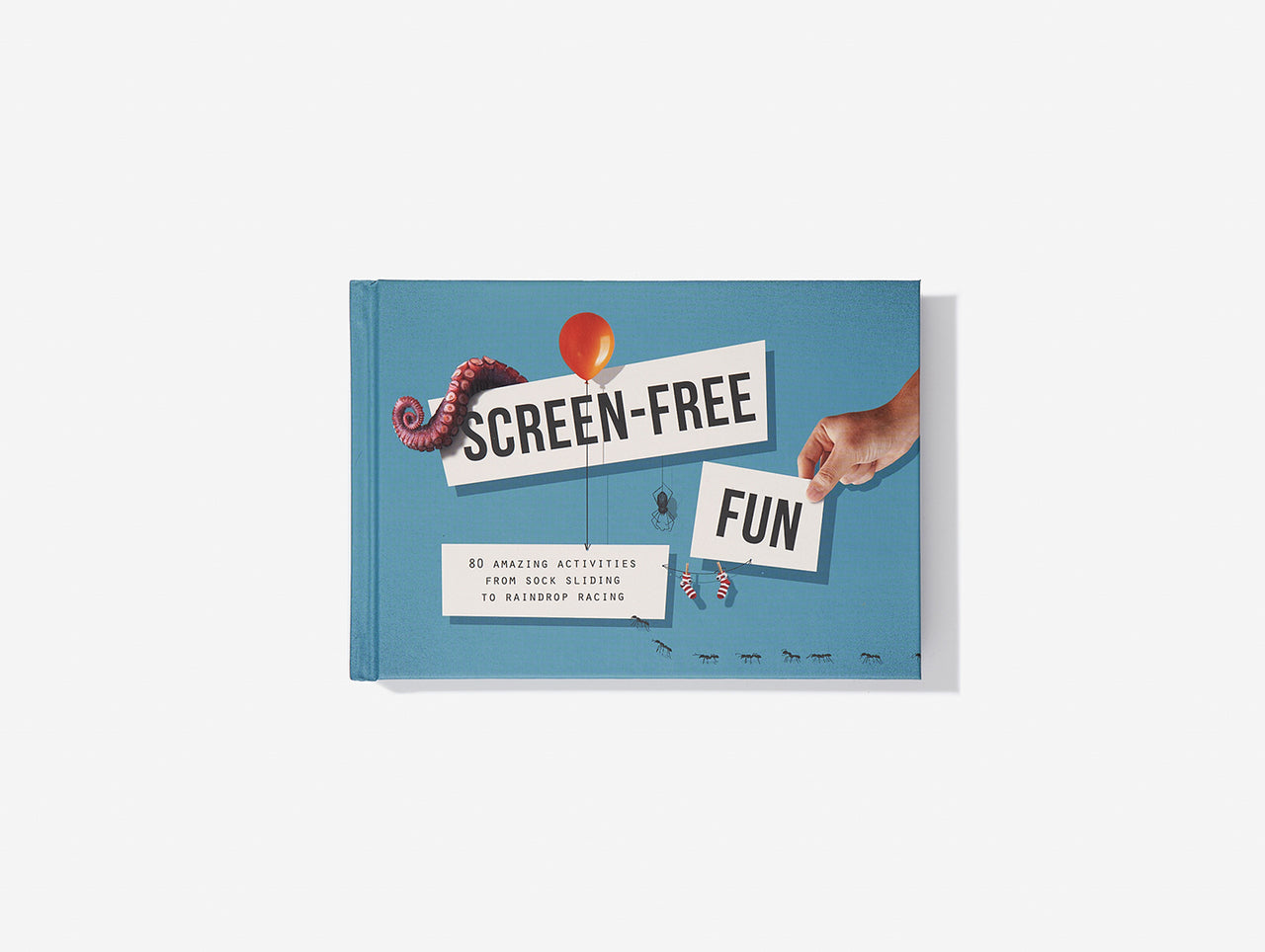 An image of a blue book with the words 'SCREEN-FREE FUN' at the centre, with a hand, a tentacle and a balloon.