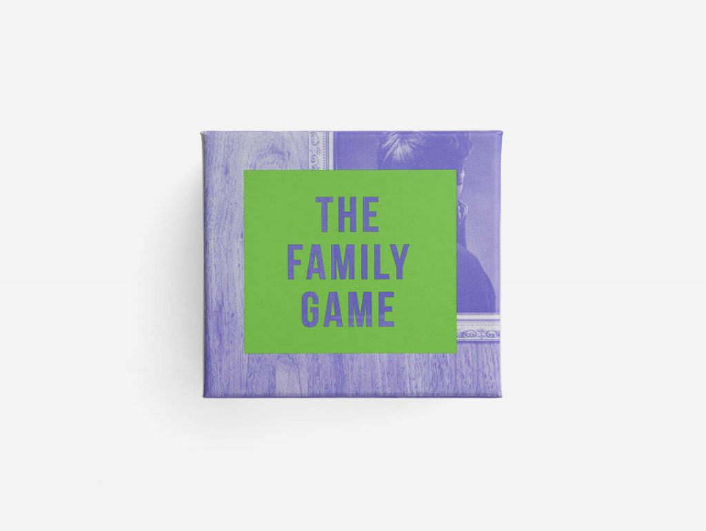 Image of a game box. The words 'THE FAMILY GAME' at the centre over a green text box.