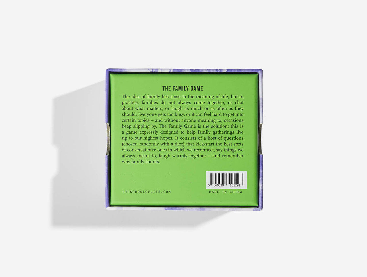 Back cover of a game box explaining 'The Family Game'