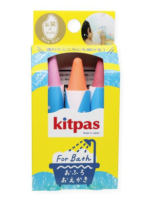 The box the rice wax bath crayons arrive in with a window showing the top of the crayons.