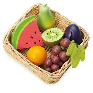 The fruit basket with the wooden fruits inside.
