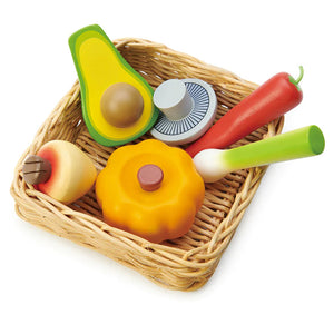 The veggie basket with the wooden vegetables inside.